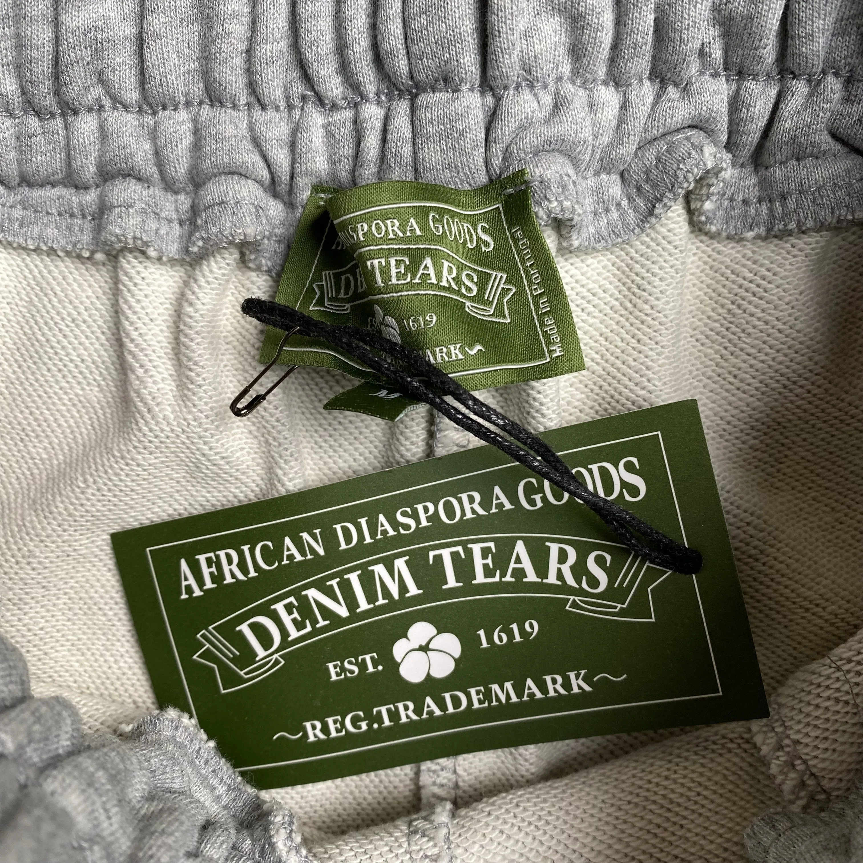 DENIM TEARS COTTON WREATH SWEATPANTS GREY